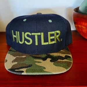 HUSTLER CAMO BASEBAL CAP